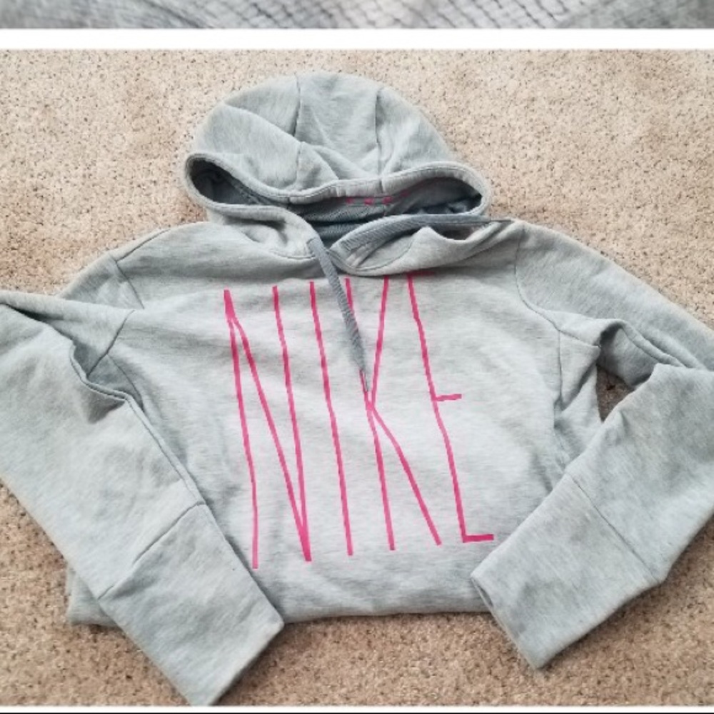a grey and pink nike hoodie